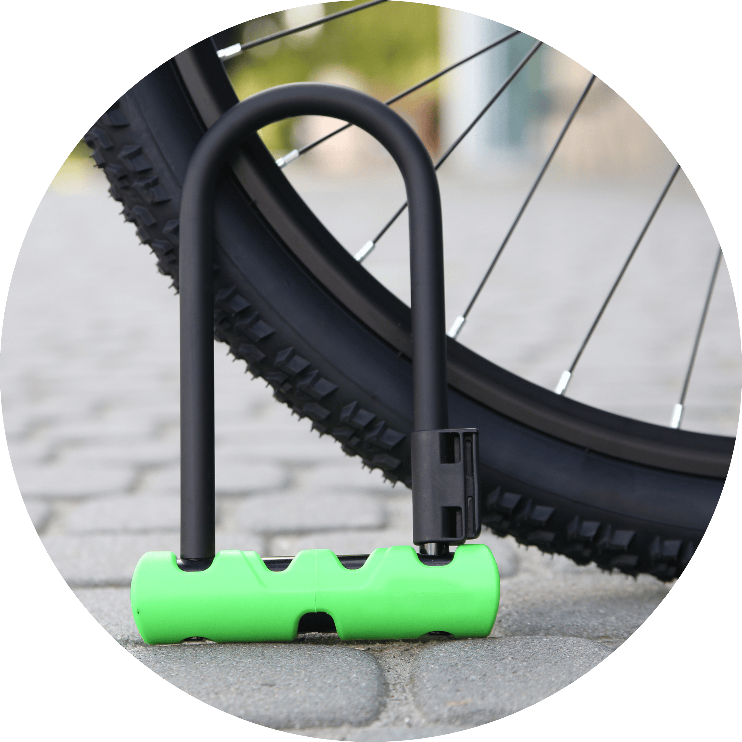 Picture of a U Shaped Bike Lock next to a pedal