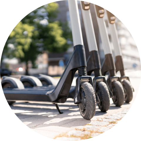A picture of several electric scooters lined up